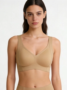 Dettaglio del reggiseno push-up beige senza cuciture con supporto morbido e schiena a U