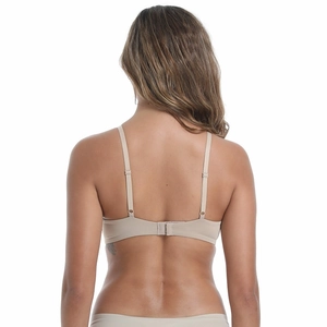 Back view of a nude wire-free seamless bra and matching briefs on a model