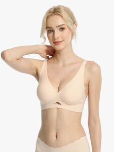 Detail view of seamless deep V-neck bra with breathable hollow mesh and silk texture
