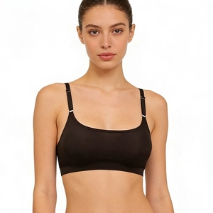 Seamless black bralette with adjustable spaghetti straps and wide elastic underband