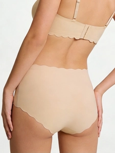 Detailed back view of seamless nude underwear set with wave-cut edges and high waist fit