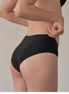 Close-up of black seamless underwear with hemmed edges and high-elasticity fabric