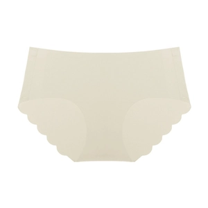 Close-up of seamless beige women's panties with laser-cut scalloped wavy edges