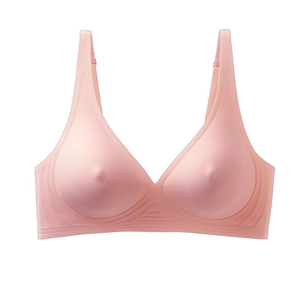 Detail of seamless nude pink bra featuring soft jelly strips and supportive nipple padding