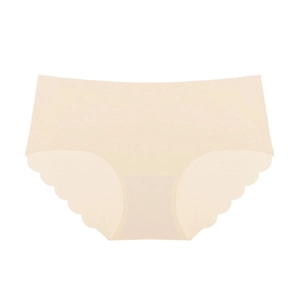 Close-up of seamless beige panties featuring scalloped edges and elastic fabric detail