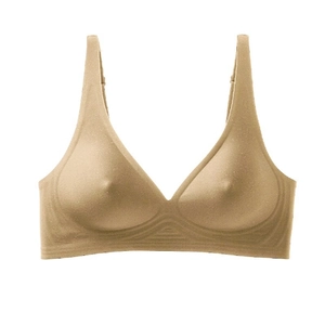 Detailed view of nude seamless wire-free bra with thin straps and smooth jelly-strip support