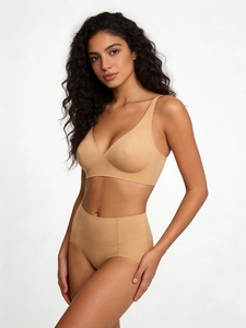 Detail of seamless nude lingerie set featuring a soft support bra and high-waisted briefs