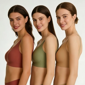 Three seamless jelly-strip bras in brick red, olive green and beige displayed on models