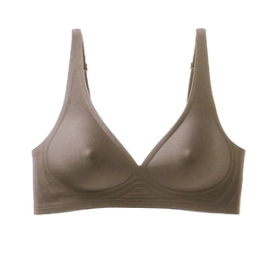 Detail view of seamless deep brown wire-free bra with reinforced support and soft texture