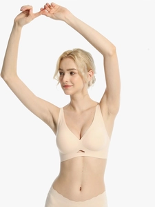 Detail of skin-toned wireless seamless bra with V-neckline and hollow-out design
