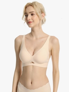 Detail of nude deep V-neck seamless bra set with teardrop hollow and cross back design