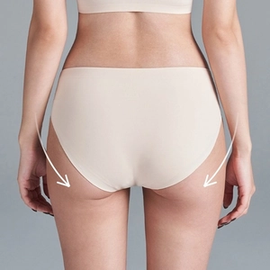 Detail of seamless skin-tone women's briefs showing elastic fit and lifting effect