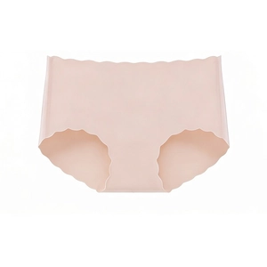 Close-up of seamless skin pink women's panties with wavy edges and breathable fabric