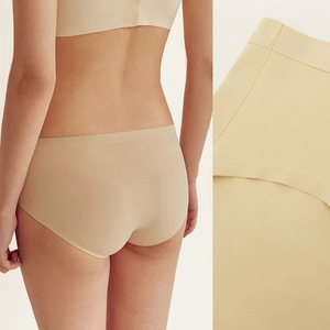Detail of seamless low-waist briefs showing the smooth fabric texture and invisible fit