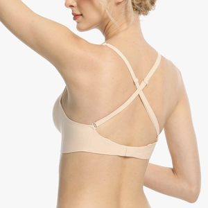 Seamless nude deep V bra featuring criss-cross back straps and a soft support design