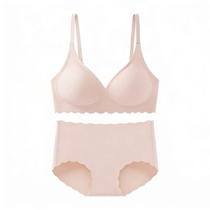 Detail of pink seamless bra and panty set featuring elegant laser-cut wavy edges