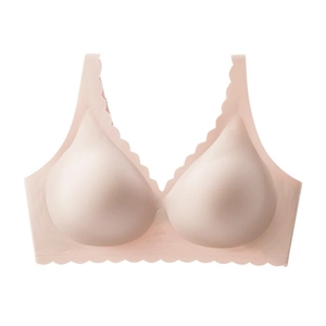 Detail of light pink seamless bra with scalloped edges and soft jelly strip support