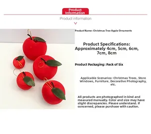 Detail of red flocked foam Christmas apple ornaments in five sizes with gold cords