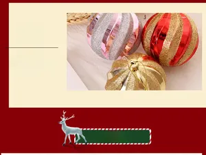 Detailed view of hand-painted spiral glitter Christmas balls in pink, red, and gold colors