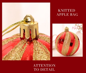 Close-up of red Christmas ornament with gold glitter spiral stripes and golden hanging loop