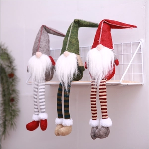 Three Christmas faceless gnome plush dolls in gray green and red colors for festive decor