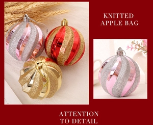 Detail of spiral Christmas baubles with glitter texture and metallic finish in red and gold