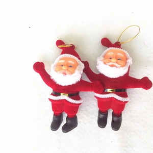 Classic red and white Santa Claus ornaments set with gold hanging strings for Christmas decor