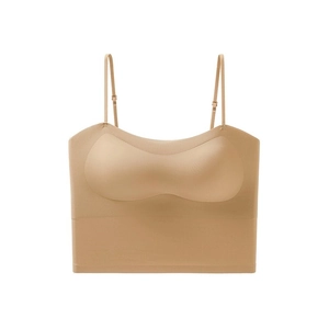 Detailed close-up of seamless skin-tone bra with adjustable straps and padded cups