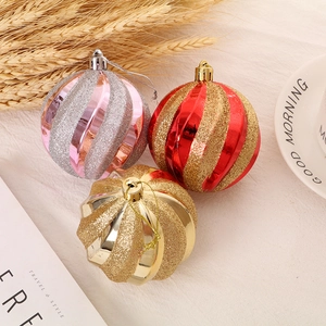 Hand-painted Christmas ornaments set with pink red and gold glitter spiral textured balls