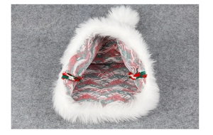 Detailed macro view showing plush white faux fur and red-green striped knitted lining
