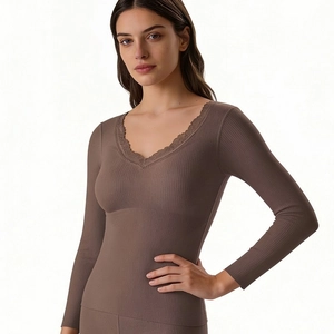 Women thermal top with V-neck lace trim and ribbed texture in brownish-tan color