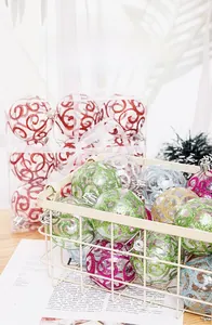 Macro detail of transparent PET Christmas baubles with colorful glitter swirl patterns