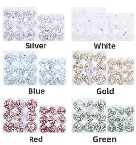 Detailed view of hollow patterned Christmas ball ornaments in six vibrant colors