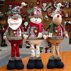 Three long-legged Christmas plush dolls featuring Santa, snowman, and reindeer figures