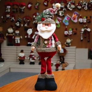 Charming long-legged Santa Claus doll with festive pine branch and berry decor