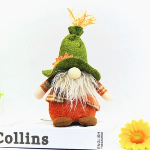 Autumn Harvest Festival gnome with green maple leaf hat and sunflowers on white books