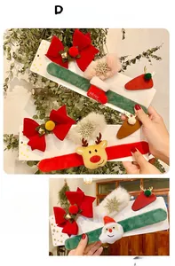 Détail d'un ensemble de Noël de 4 pièces avec bracelets de renne et nœuds de cheveux en velours