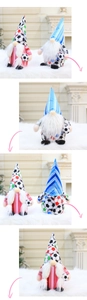 Detail view of football gnomes with plush beards and knit hats in sporty home decoration
