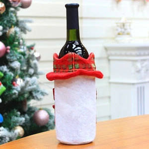 Close-up of white plush Christmas wine bottle cover with red and green plaid collar decoration