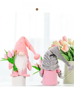 Detail of tulip gnome plush dolls with pointy hats and flowers for home decor