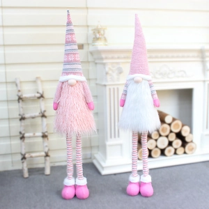 Pink and white Christmas Gnomes with long striped legs for festive home shelf decoration