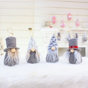 Set of four handmade Christmas plush gnomes ornaments with white beard and gold hanging strings