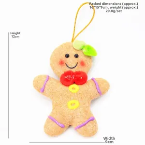 Detail showing plush gingerbread man ornament with measurements 12cm height and 9cm width