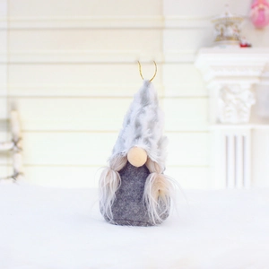 Pink faceless gnome plush Christmas ornament with grey felt body and white long beard