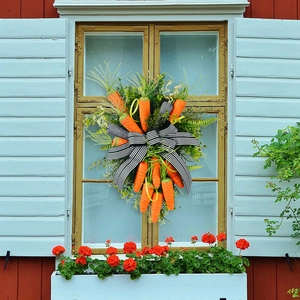 50cm Easter carrot wreath with black and white bow on vintage wooden window