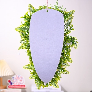 50cm Easter carrot wreath wall hanging with purple felt base and lush faux greenery