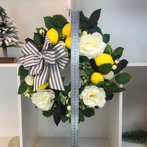 Artificial flower wreath with yellow lemons, white roses and striped bow, 45cm diameter