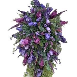 Elegant purple tulip and lavender teardrop wreath with lush green fern leaves home decor