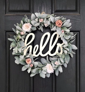 Detail of hello wooden sign on 30cm Easter floral wreath with pink roses and lamb's ear leaves