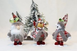 Detail of Christmas plush figurines with knit fabric and stable snowflake base
